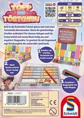 Verpackung des Kinderspiels Topp das Törtchen mit Spielanleitung und Illustrationen.