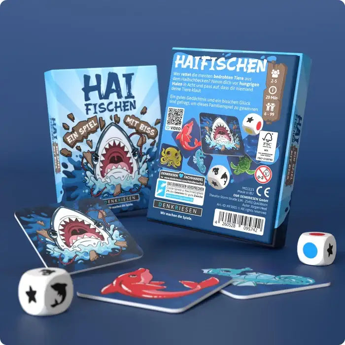 Haifisch-Spiel mit bunten Karten und Würfeln für Familienunterhaltung